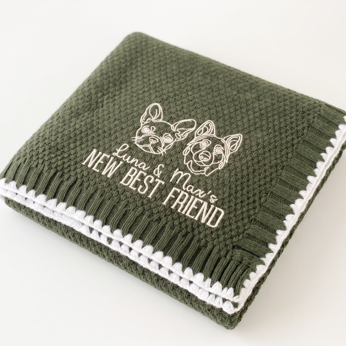 Personalized pet portrait baby blanket in olive knit, embroidered dog and cat with "Luna & Max's New Best Friend"