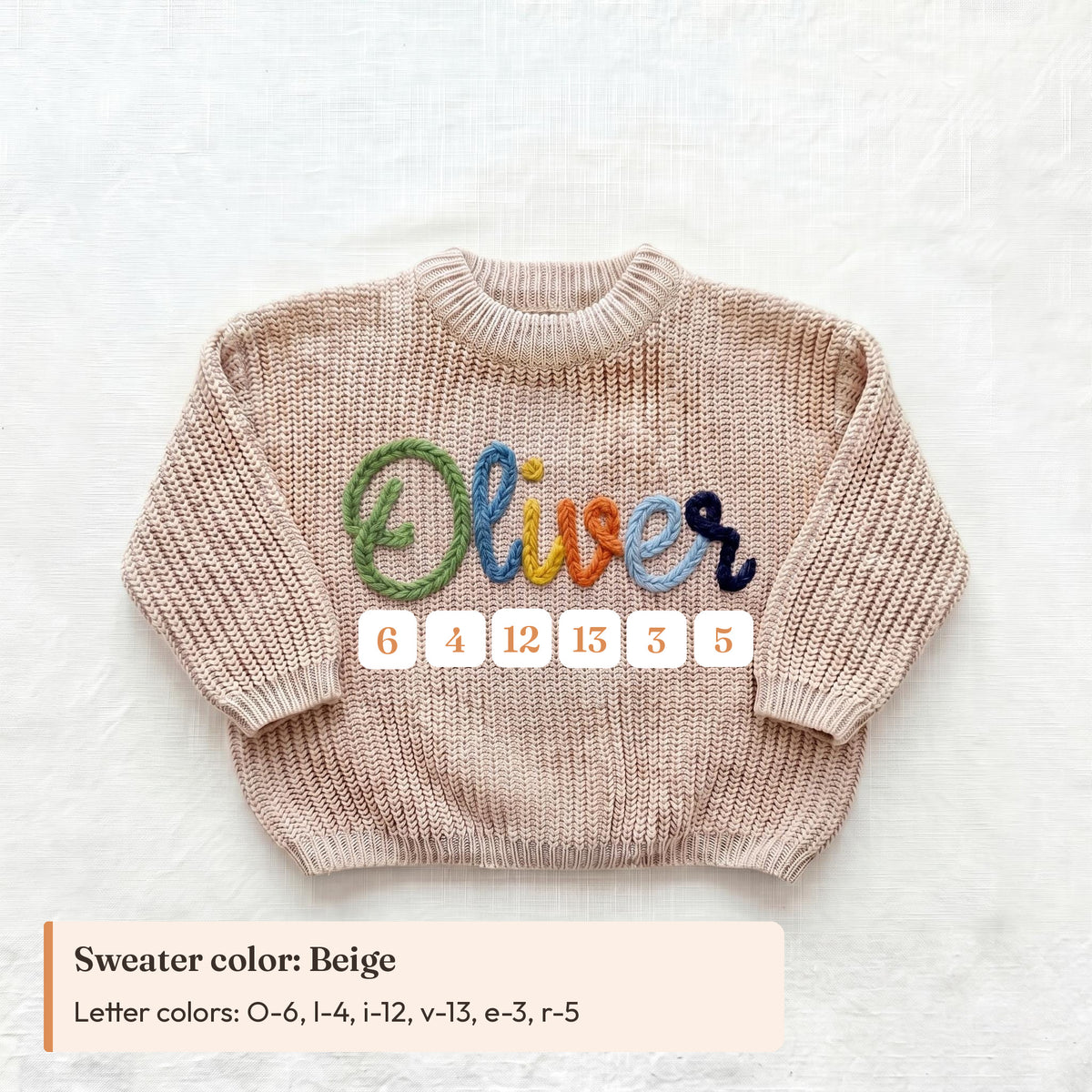 Example of choosing a yarn color for each letter: beige sweater with name Oliver, letter colors O-6, l-4, i-12, v-13, e-3, r-5