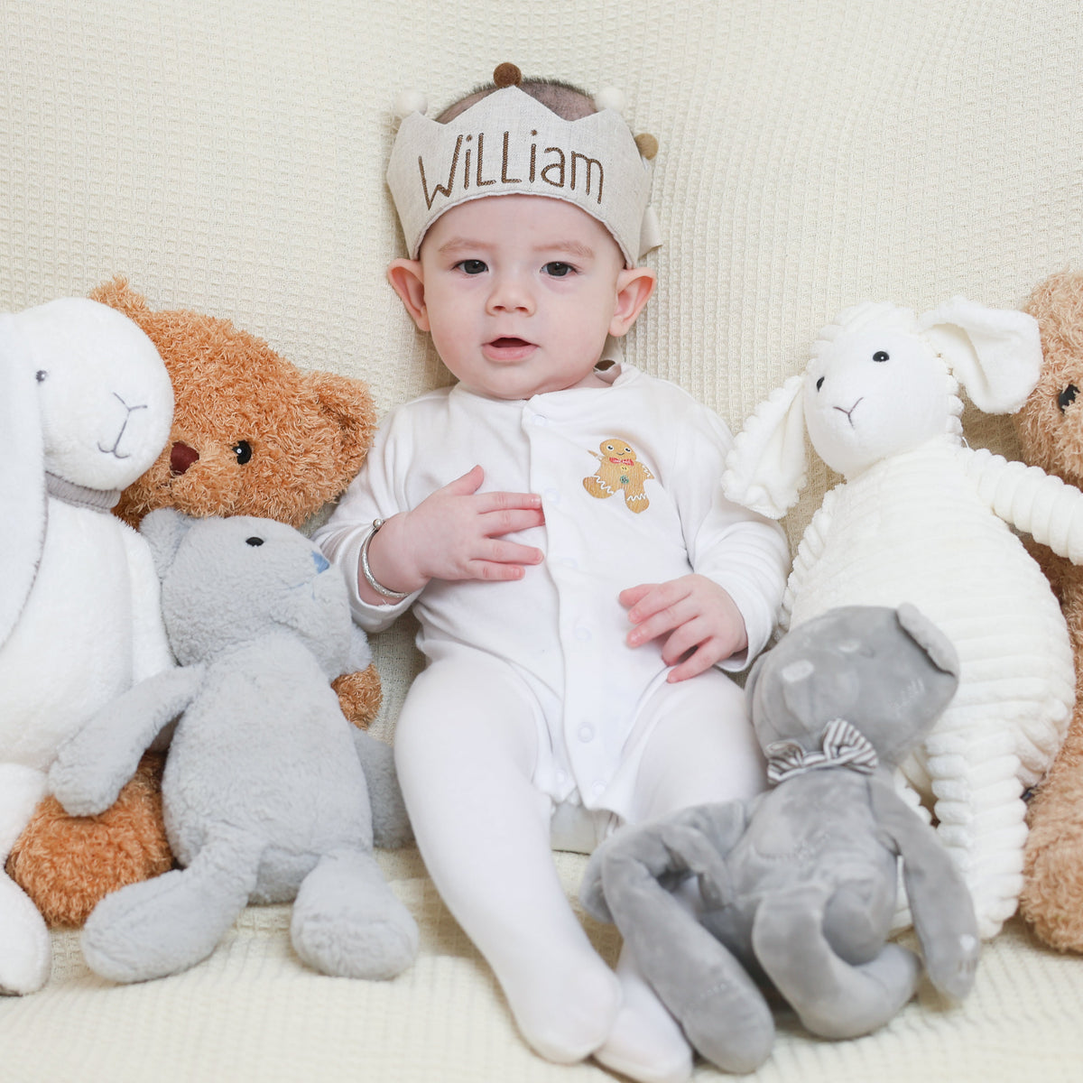 Embroidered custom name first birthday crown as a popular choice for baby boy gifts