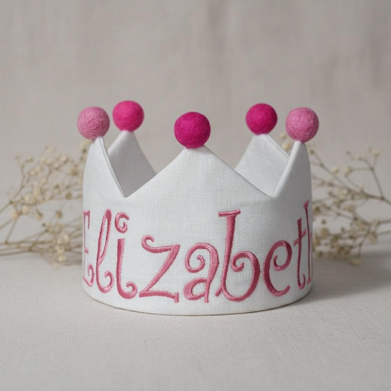 Embroidered custom name first birthday crown for families celebrating baby milestone moments