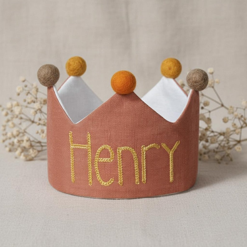 Embroidered custom name first birthday crown as a popular choice for baby boy gifts