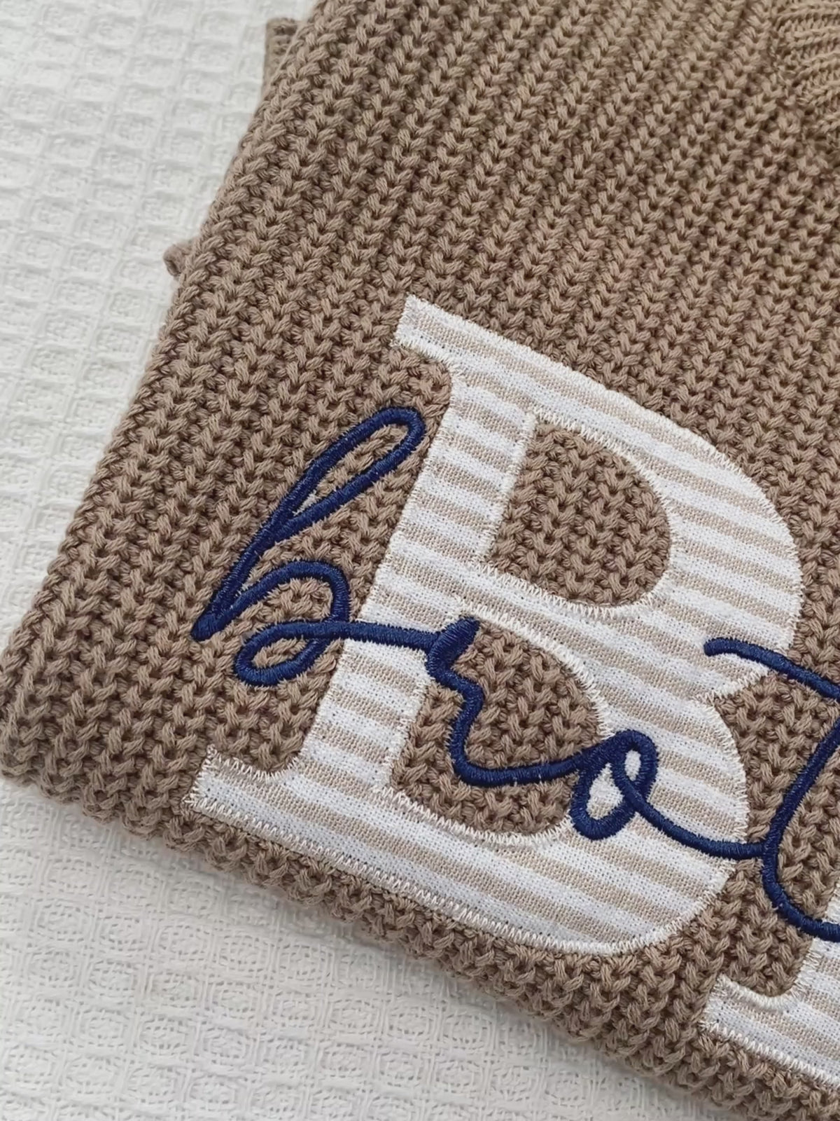 Video of the Big Brother applique embroidered knit sweater